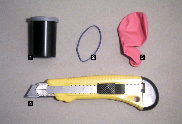 Film can, rubber band, balloon, cutter